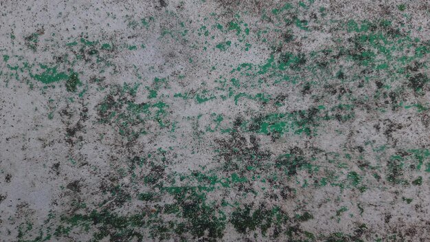 Green paint on the concrete floor