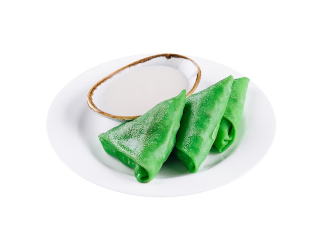 Green pancakes from spinach with sour cream