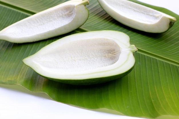 Green papaya on banana leaves