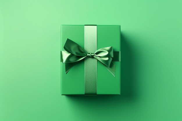 Green paper gift box on green background Green friday Sustainable consumption sustainability zero waste concept Top view Copy space for text