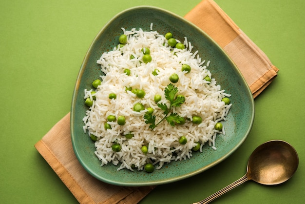 Green peas Basmati rice or matar pulav, served with plain dal