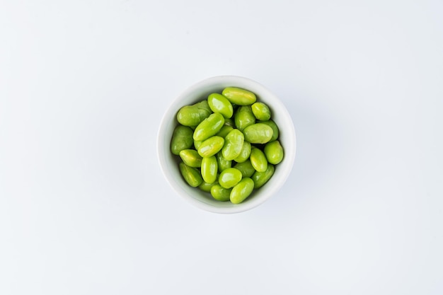 Green peas in a bowl View from above Flat lay