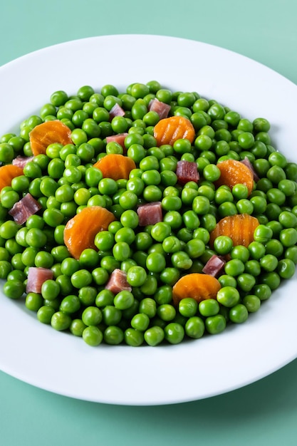 Green peas serrano ham and carrot