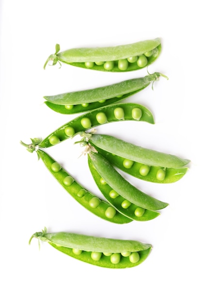 Green peas on a white background. raw diet