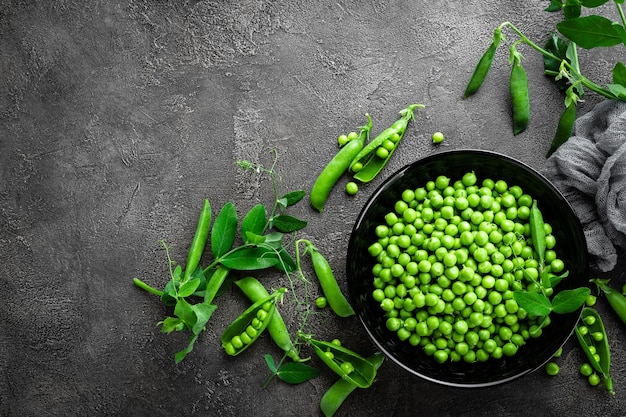 Green peas with pods and leaves