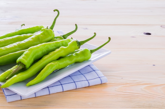 Green pepper on a plate For Cooking