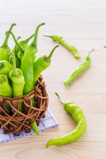 Photo green pepper in a small pot.