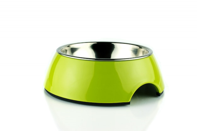 Green pet bowl.  methacrylate food container for  dog or cat. Isolated