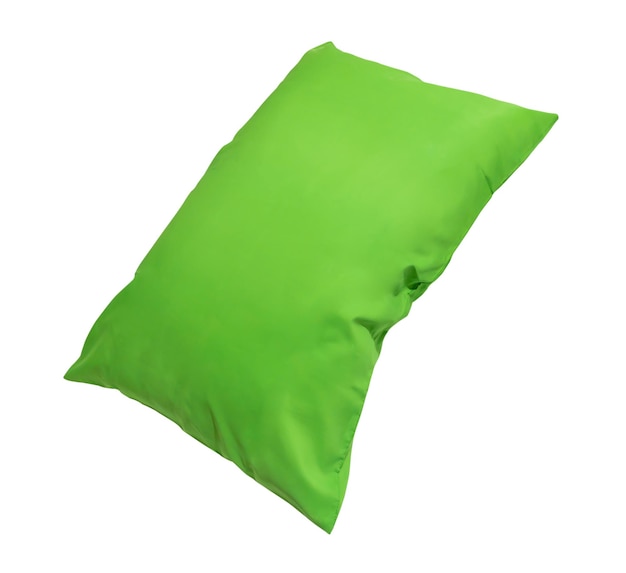 Green pillow at hotel or resort room isolated on white background with clipping path Concept of confortable and happy sleep in daily life