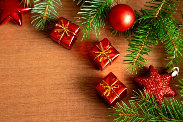 Green pine branches along with Christmas decorations