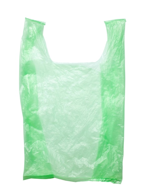 Green plastic bags isolated against a white background Environmental pollution by recycling