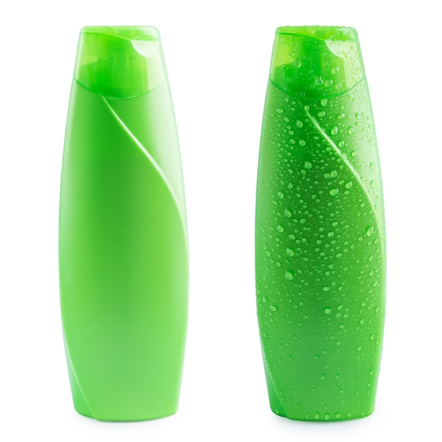 green plastic bottle shampoo with water drop on white