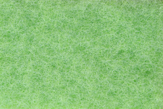 Green plastic fibers texture background.