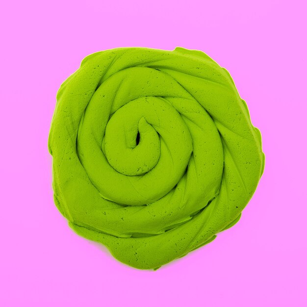 Green plasticine curls minimal colours art