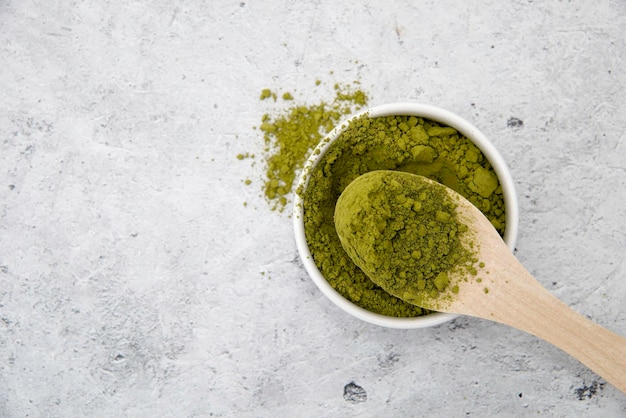 green powdered matcha tea in a porcelain cup a place to copy