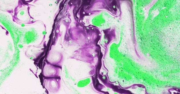 A green and purple paint with a white background