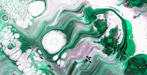 A green and purple painting of a green marble with the word green on it.