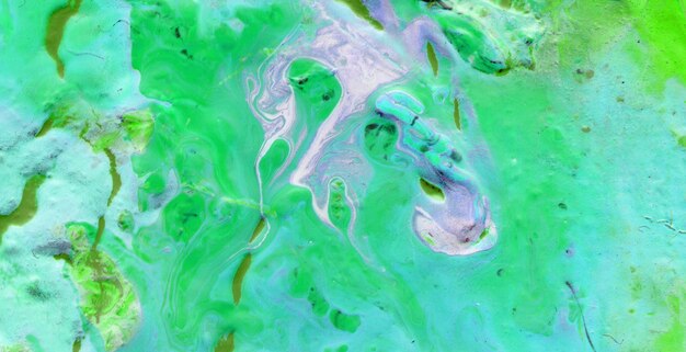 A green and purple painting of a person's face