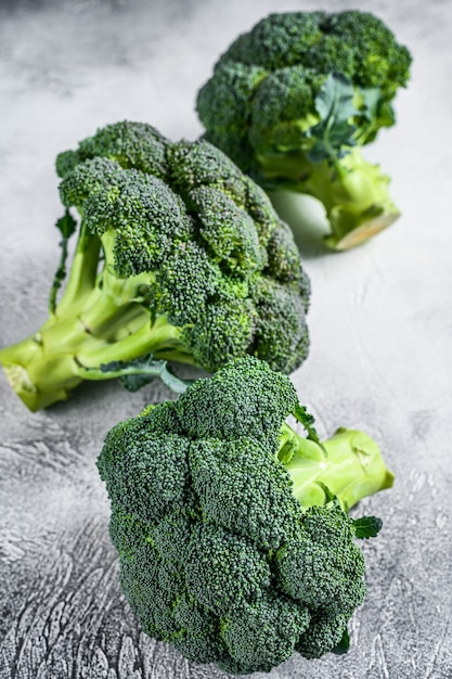 Green raw broccoli cabbage. White background. Top view.