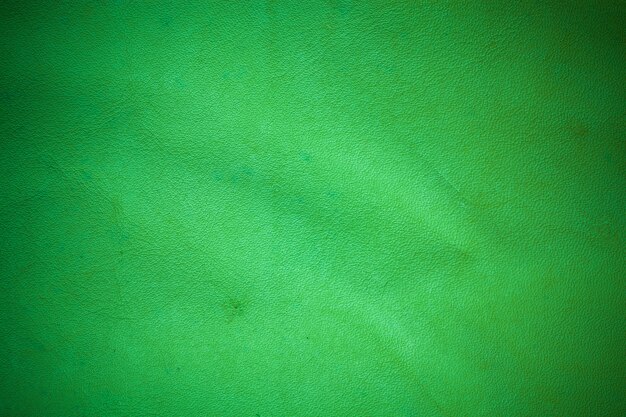 Green real leather background.