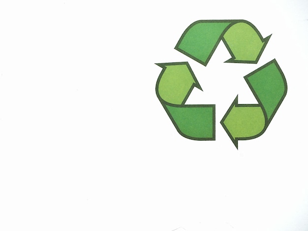 Green recycling symbol isolated on white