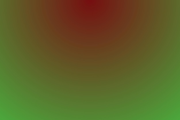 A green and red background with a red light that is blurred.