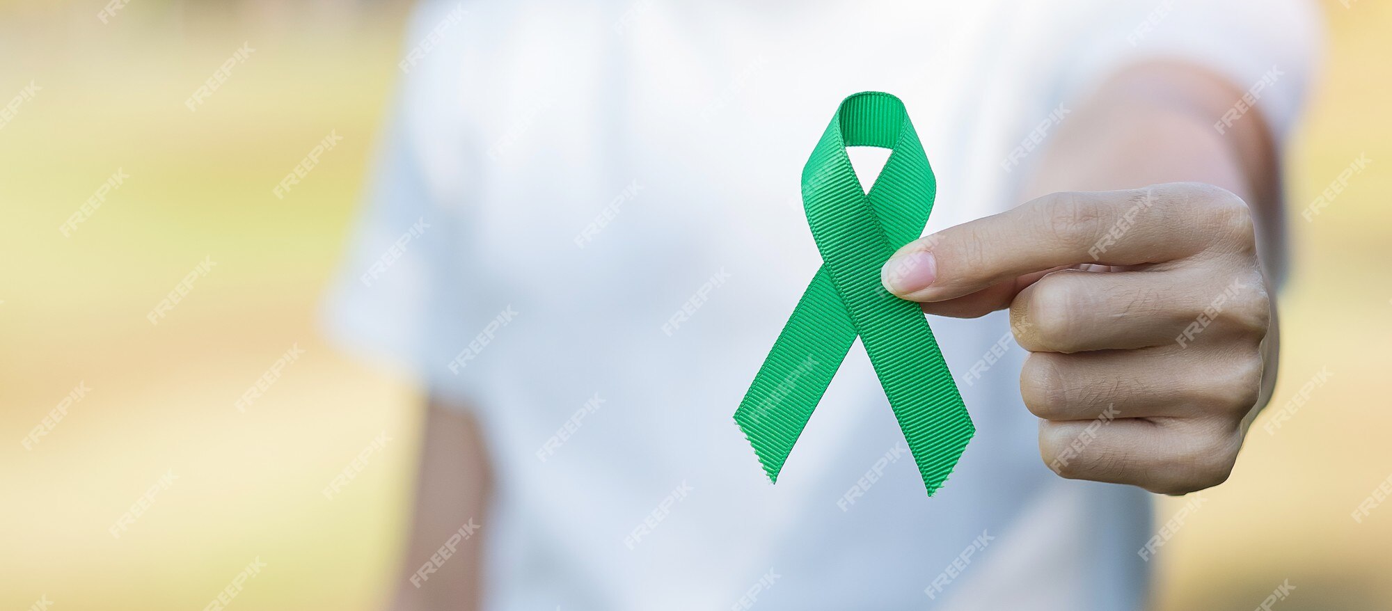 Premium Photo  Green awareness ribbon of gallbladder and bile