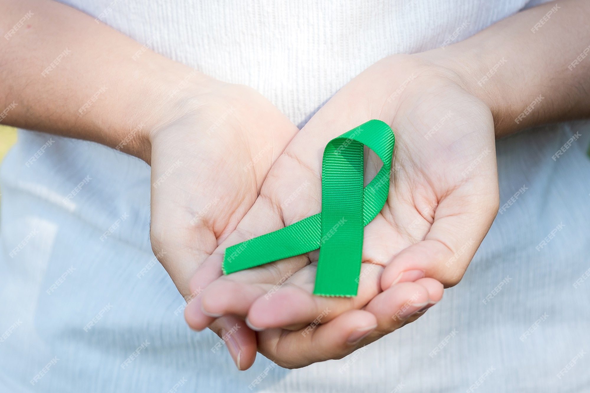 Premium Photo  Green awareness ribbon of gallbladder and bile