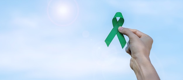 green ribbon for liver, gallbladders bile duct, kidney cancer and lymphoma awareness