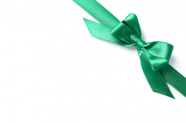 Green ribbon with bow isolated on white