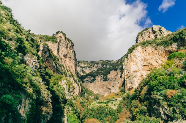 Green rocky cliff