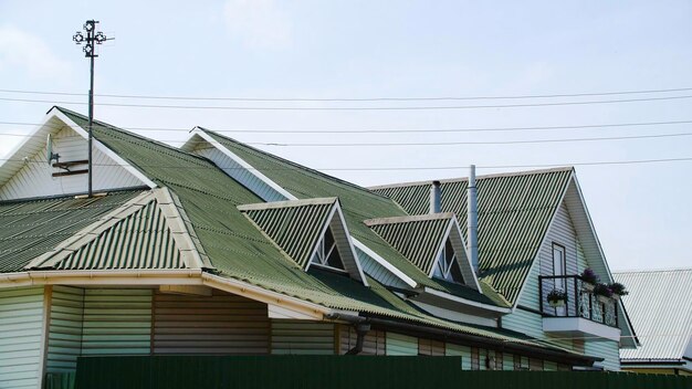 Green roof coating stock footage beautiful green roof is made of profiled flooring new roof covering