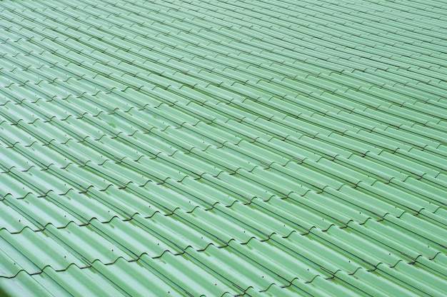 Photo green roof tiles pattern and background