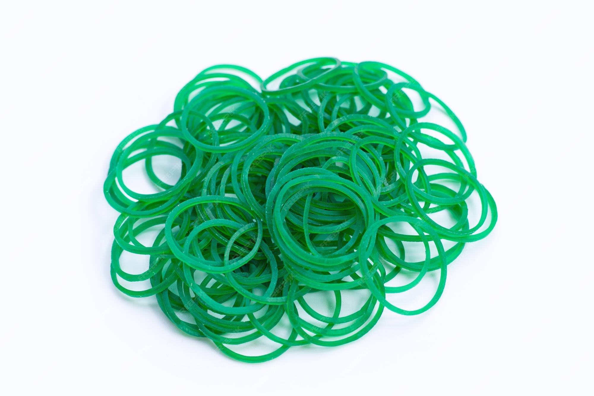 Premium Photo Green rubber band on white background