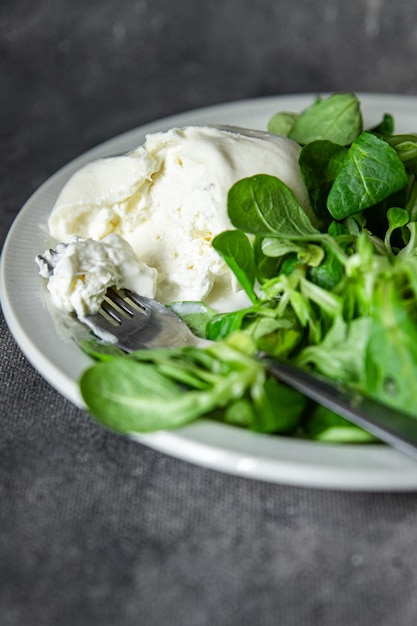 green salad buratta leaves mix fresh healthy meal food snack on the table copy space food