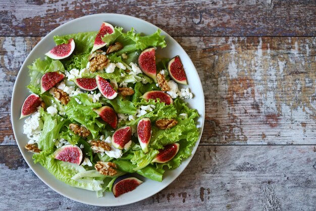 Green salad with figs and white cheese. Keto salad. Keto diet.