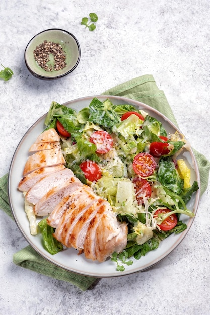 Green salad with grilled chicken breast