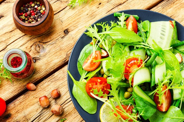 Green salad with vegetables and nuts.Healthy food