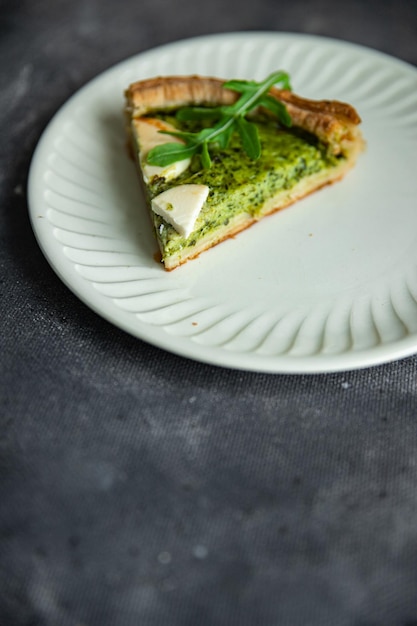 green savory pie spinach tart cheese fresh healthy meal food snack on the table copy space food