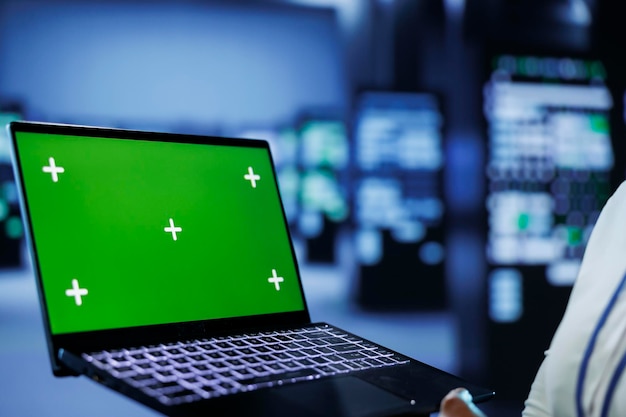 Green screen laptop monitoring servers