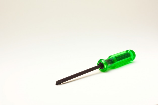 Green screwdriver with shadow