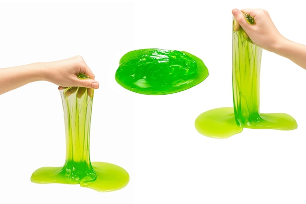 Green slime toy in woman hand isolated on white