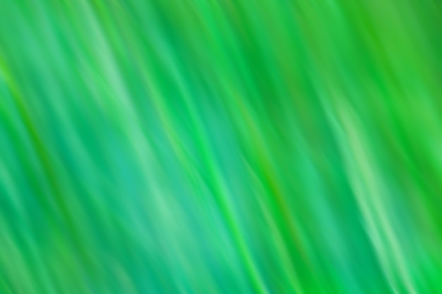 Green slow shutter speed with motion blur effect Decorative backdrop fast speedy motion no focus