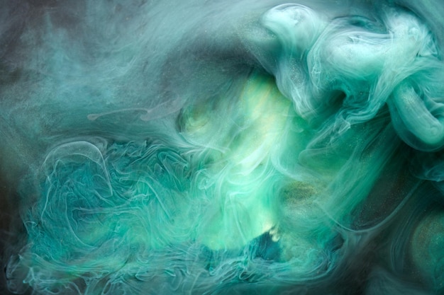 Green smoke abstract background acrylic paint underwater explosion