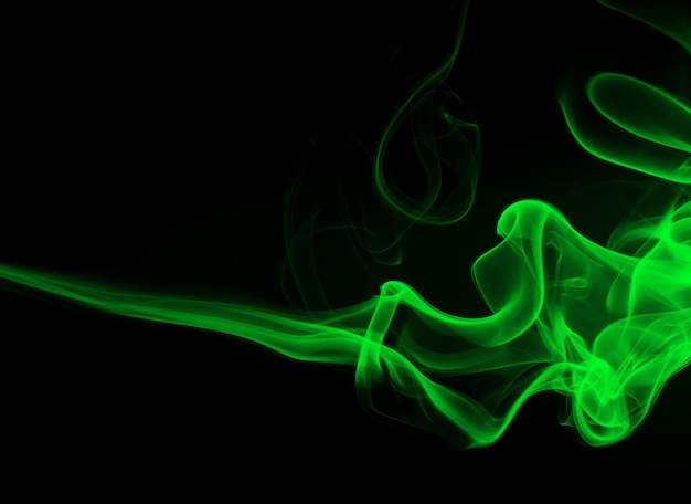 Green Smoke abstract background and darkness concept