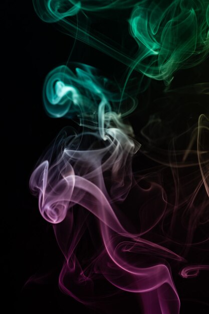 Green smoke against a black background