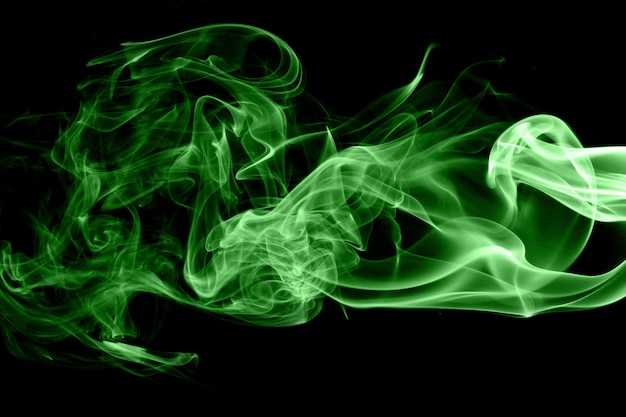 Green smoke on black background