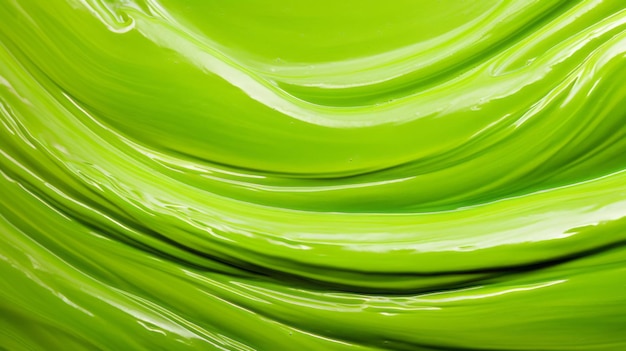 Green smooth paint texture closeup swirl abstract background