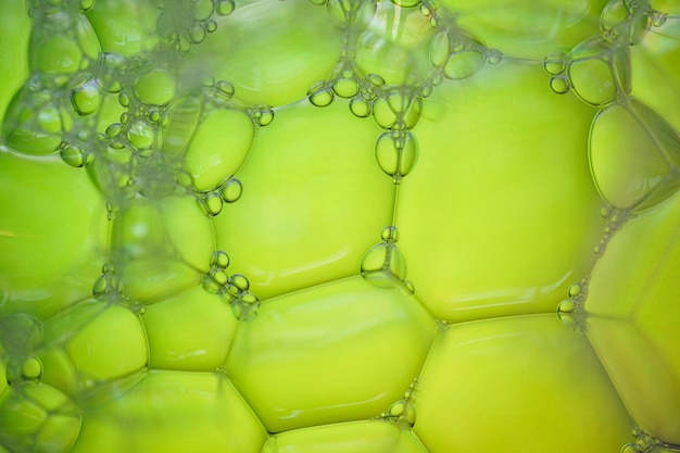 Photo green soap bubbles green abstract background