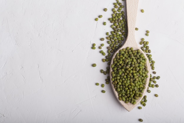 Green soy beans on the white background with copy space